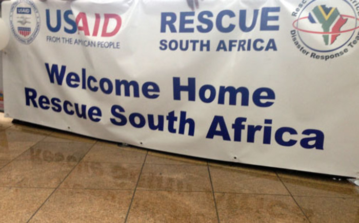 A welcome banner for the Rescue SA team which arrived at OR Tambo International Airport after their mission to the Philippines. Picture: Reinart Toerien/EWN.