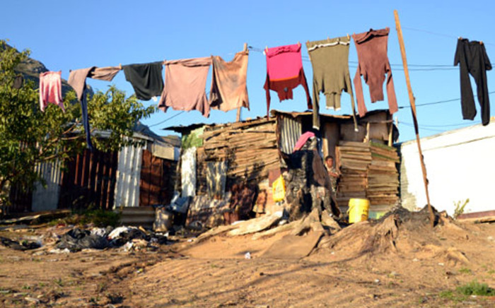 A shack dweller's washing dries in the wind in the Langrug informal settlement outside Franschhoek. Picture: EWN