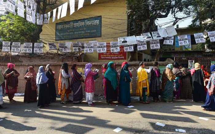 Bangladeshi voters wait in line outside a polling station in Dhaka on 30 December 2018. Bangladesh headed to the polls following a weeks-long campaign that was dominated by deadly violence and allegations of a crackdown on thousands of opposition activists. Picture: AFP