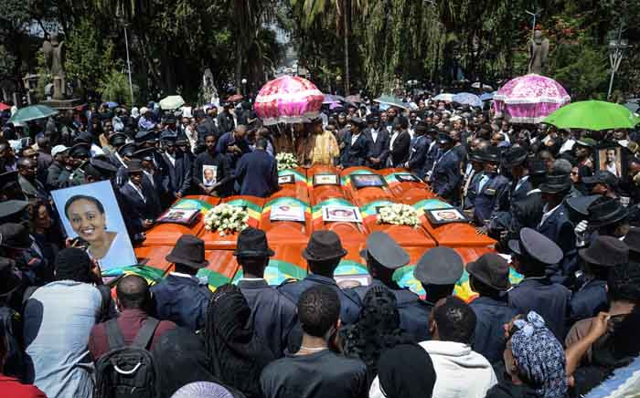 Coffins of victims of the crashed accident of Ethiopian Airlines are gathered during the mass funeral at Holy Trinity Cathedral in Addis Ababa, Ethiopia, on 17 March 2019. The crash of Flight ET 302 minutes into its flight to Nairobi on 10 March killed 157 people onboard and caused the worldwide grounding of the Boeing 737 MAX 8 aircraft model involved in the disaster. Picture: AFP
