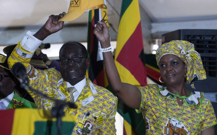 FILE: Zimbabwean President and Zanu PF leader Robert Mugabe and his wife Grace. Picture: AFP.