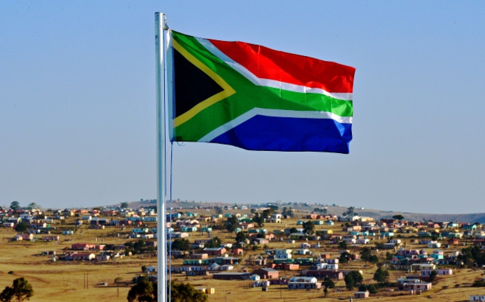 The South African flag flies near Qunu. Picture: AFP.