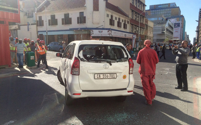 FILE: A damaged vehicle is seen during a protest by metered taxi drivers against Uber in the Cape Town CBD. Picture: Supplied.