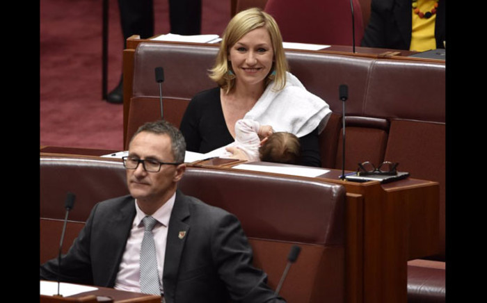 Australian senator Larissa Waters breastfeeding her daughter in Parliament. picture: @larissawaters.