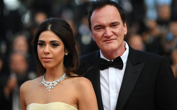 US film director Quentin Tarantino (R) and his wife Israeli singer Daniella Pick pose as they arrive for the screening of the film "The Specials (Hors Normes)" at the 72nd edition of the Cannes Film Festival in Cannes, southern France, on May 25, 2019. Picture: AFP