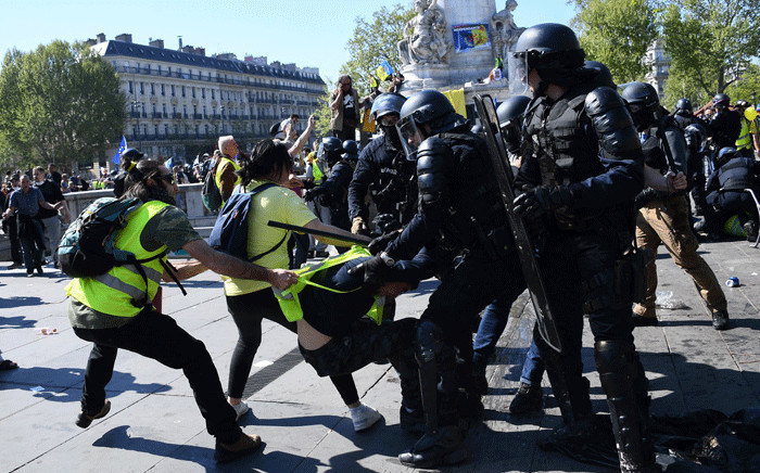 Anti-riot police clash with protesters during an anti-government demonstration called by the "Yellow Vests" (gilets jaunes) movement, on April 20, 2019 in Paris. Picture: AFP.
