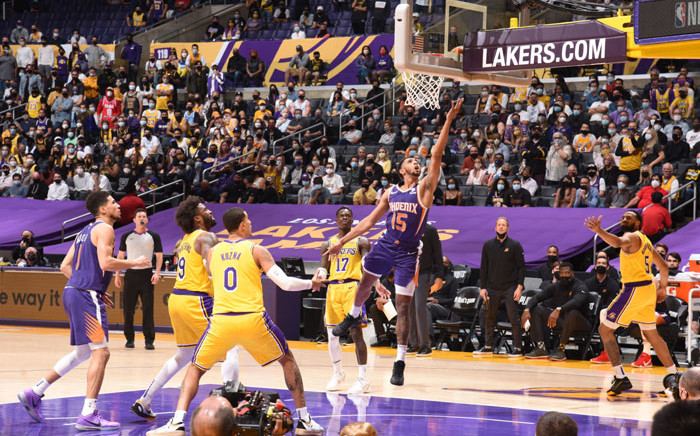 Cameron Payne #15 of the Phoenix Suns shoots the ball against the Los Angeles Lakers during Round 1, Game 6 of the 2021 NBA Playoffs on 3 June 2021 at STAPLES Center in Los Angeles, California. Copyright 2021 NBAE. Picture: Andrew D. Bernstein/NBAE/Getty Images via AFP