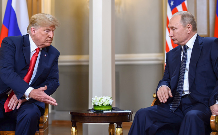 US President Donald Trump (L) and Russian President Vladimir Putin are pictured ahead of their meeting in Helsinki, on 16 July 2018. Picture: AFP