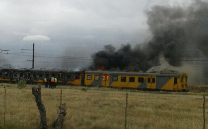 Cape Town firefighters on the scene of a burning train on Century City line. Picture: City of Cape Town.