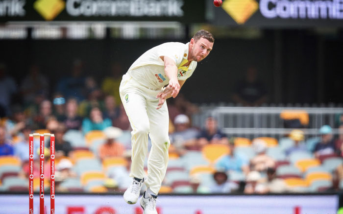 Australia's Josh Hazlewood bowls during day one of the first Ashes cricket Test match between England and Australia at the Gabba in Brisbane on 8 December 2021. Picture: Patrick Hamilton/AFP