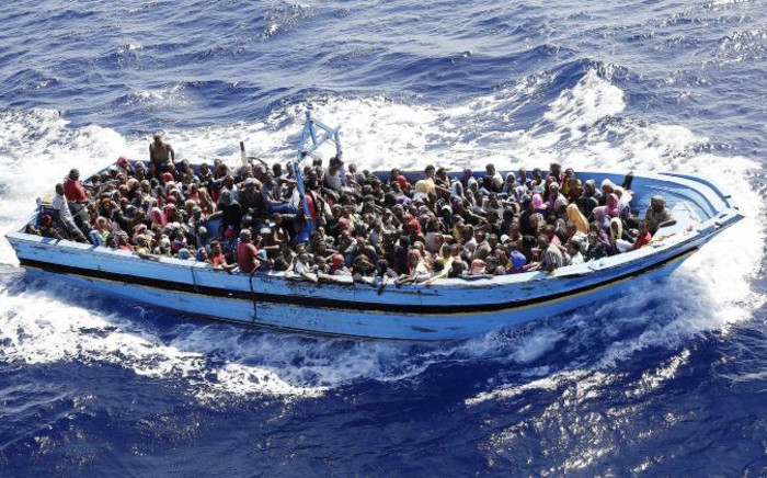 FILE: More than 900 illegal migrants are shipped to the mainland after being rescued by Italian Navy boat 'Fregata Euro' in the Mediterranean Sea, 12 September 2014. Picture: EPA.