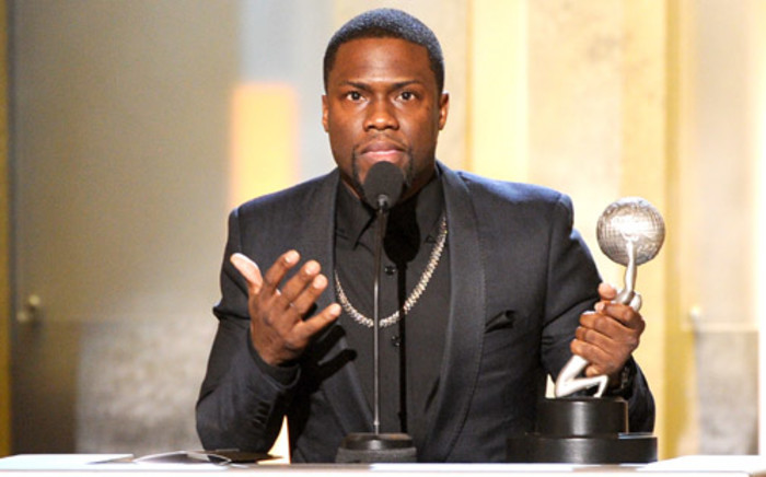 Actor/producer Kevin Hart accepts the Entertainer of the Year award onstage during the 45th NAACP Image Awards presented by TV One at Pasadena Civic Auditorium on 22 February, 2014 in Pasadena, California. Picture: AFP.