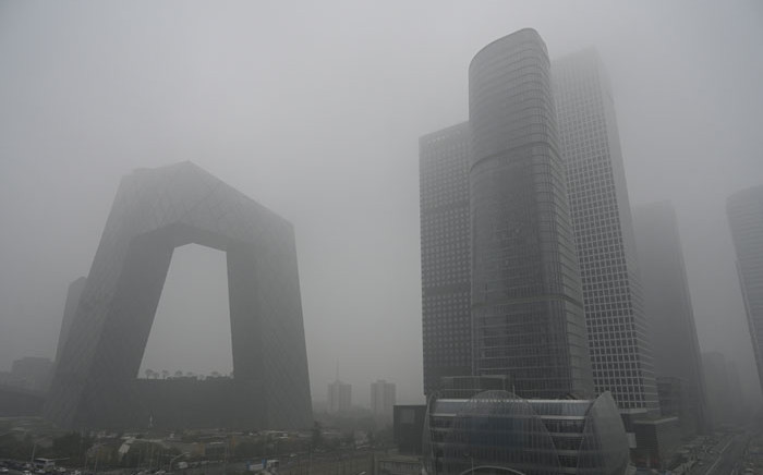 Buildings are seen in the central business district on a polluted day in Beijing on 5 November 2021. Picture: JADE GAO/AFP