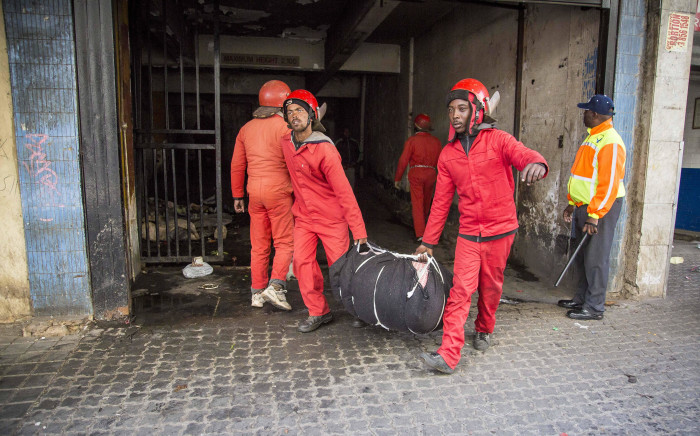 FILE: Red Ants evict residents of a block of flats on Harrison Street in Jeppestown. Picture: Thomas Holder/EWN