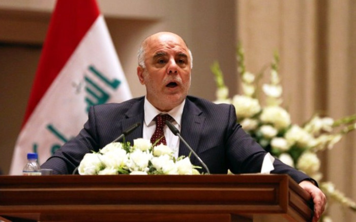 FILE: Iraq's new Prime Minister Haider al-Abadi speaks to Iraqi lawmakers before submitting his government for approval in Baghdad on 8 September, 2014. Picture: AFP.