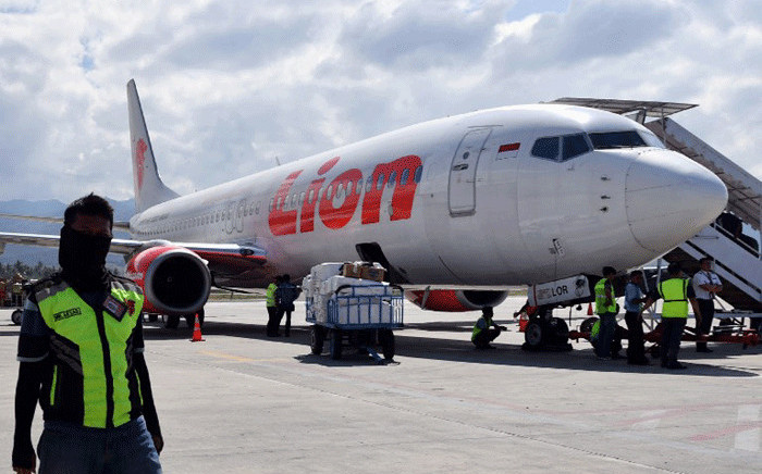 File: This photo taken on 10 October, 2018 shows a Lion Air Boeing 737-800 aircraft at the Mutiara Sis Al Jufri airport in Palu. Picture: AFP.