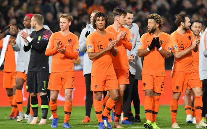 Netherlands players celebrate after winning the Uefa Nations League football match between the Netherlands and France at the Feijenoord stadium in Rotterdam on 16 November, 2018. Picture: AFP.