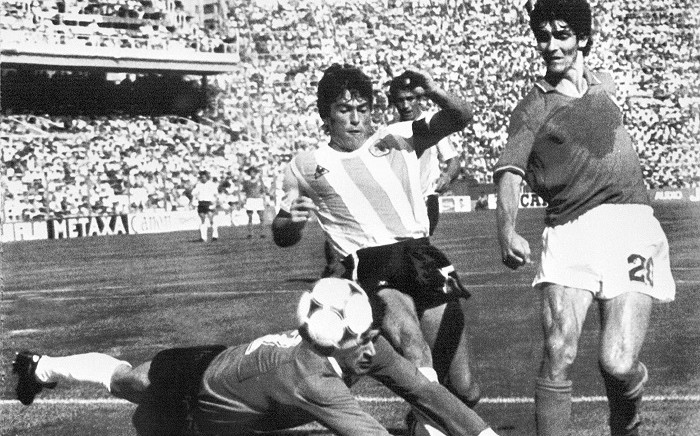 In this file photo taken on June 29, 1982 Argentinian goalkeeper Ubaldo Fillol (Bottom) and captain Daniel Passarella (L) prevent Italian striker Paolo Rossi from scoring, during the World Cup second round soccer match between Italy and Argentina in Barcelona. Paolo Rossi, a hero of Italian football who inspired the national side to victory in the 1982 World Cup, has died aged 64, Italian media reported on December 10, 2020. Picture: AFP