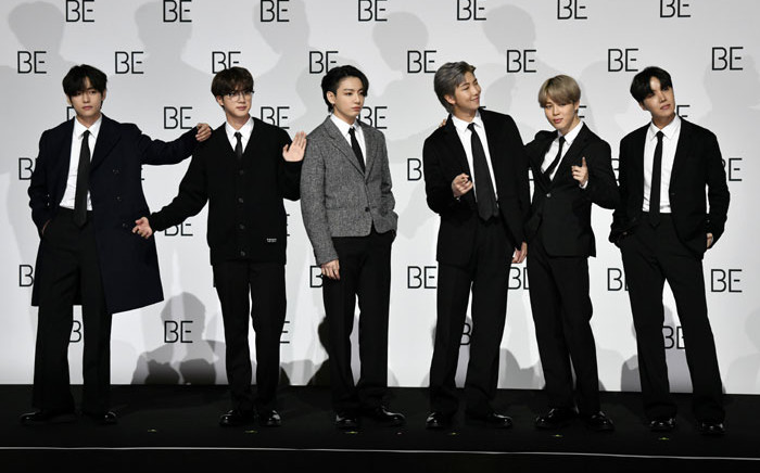 South Korean K-pop boy band BTS members (L to R) V, Jin, Jung Kook, RM, Jimin and J-Hope pose for a photo session during a press conference on BTS new album 'BE (Deluxe Edition)' in Seoul on 20 November 2020. Picture: AFP