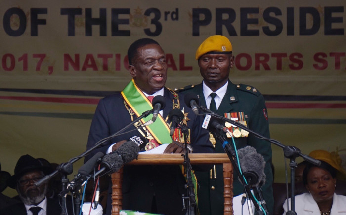Newly sworn-in President Emmerson Mnangagwa speaks during the inauguration ceremony at the National Sport Stadium in Harare, on 24 November 2017. Picture: AFP