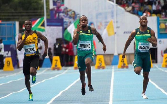 SA sprinters Akani Simbine and Simon Magakwe in actio in at the CAA African Senior Championships in Asaba, Nigeria on 2 August 2018. Picture: @iaaforg/Twitter