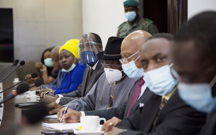 FILE: Former Nigerian president Goodluck Jonathan (C), wearing a face mask, prepares for a meeting between Malian military leaders and an Ecowas delegation headed by former Nigerian president on 22 August 2020, in an aim to restore order after the military coup in Bamako. Picture: AFP