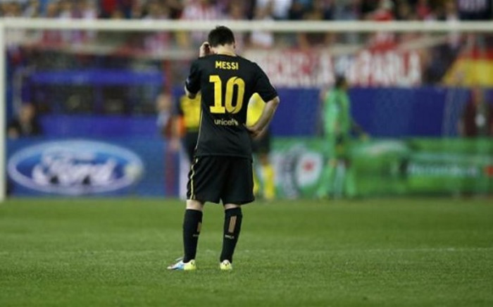 FC Barcelona's Lionel Messi looks dejected after his side's Champions League exit. Picture: AFP.
