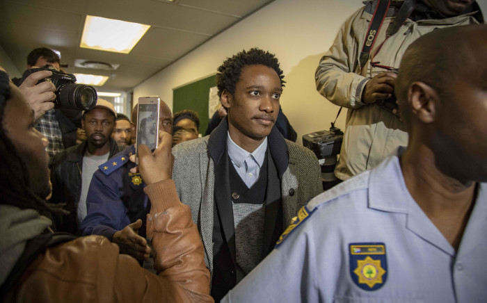 Duduzane Zuma leaves the Commercial Crimes Court after being charged with corruption and granted R100k bail. Picture: Thomas Holder/EWN