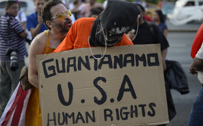A man demonstrates against the US Guantanamo prison ahead of the Peoples Summit to be held in parallel with the VII Americas Summit, in Panama City on 9 April, 2015. Picture: AFP.