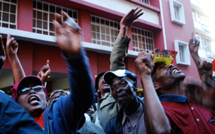 Protesters shout at their working colleagues during the municipal workers protest in the Joburg CBD on 27 July, 2009. Picture: Taurai Maduna/Eyewitness News