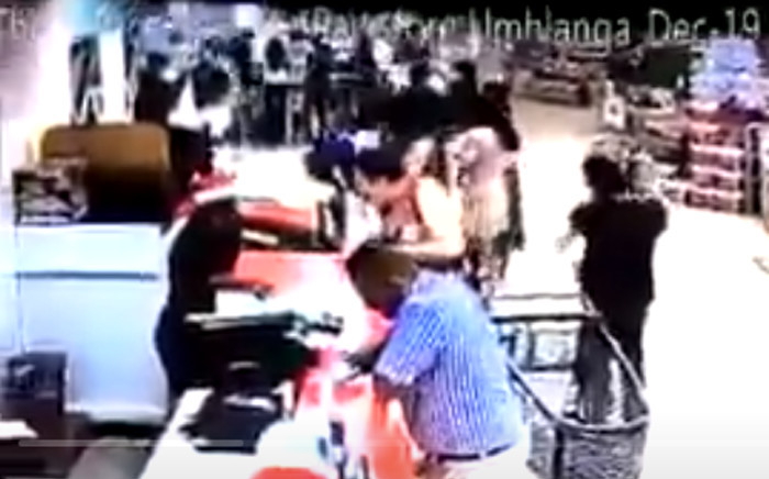 A video screengrab of a man taking the child from a trolley at a shopping mall in Umhlanga, Durban.