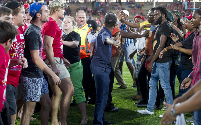 Students and protesters clash during a rugby match at the University of the Free State on 22 February 2016. Picture: EPA.