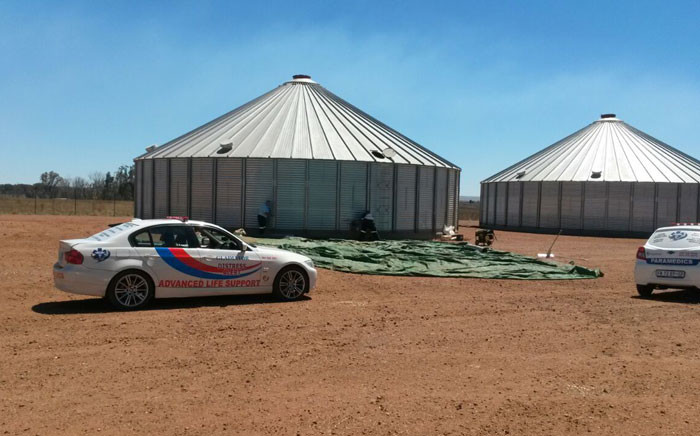 Forensic teams at the Carletonville silo where a man's body was found. Picture: Gladiator Distress Alert