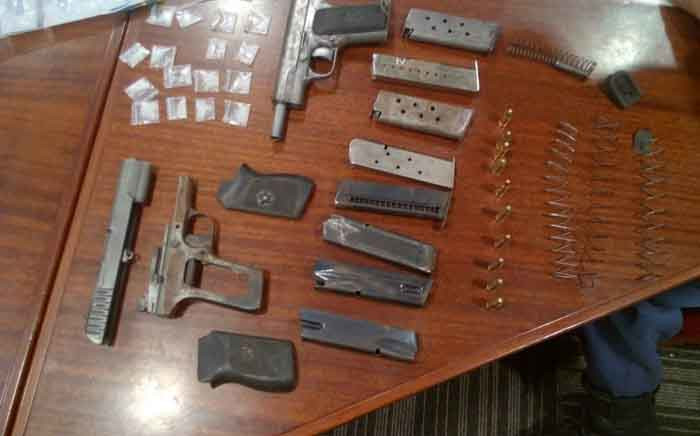 A dismantled firearm, ammunition and drugs seized by members of the Anti-Gang Intervention Unit in Bishop Lavis, Cape Town. Picture: SAPS.