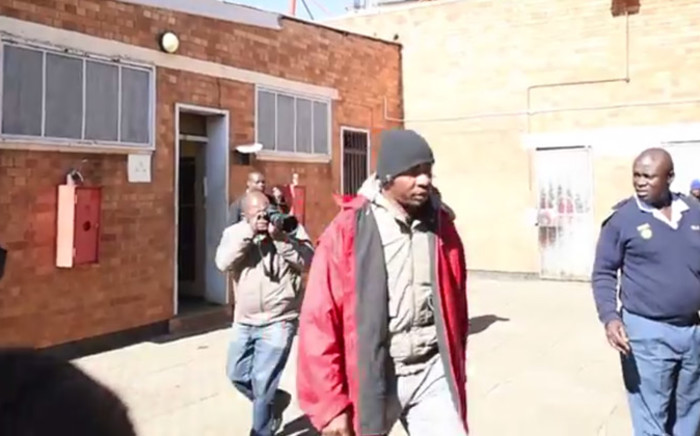 Former Jozi FM DJ Donald Sebolai arriving at Jabulani Police Station. Picture: 'Daily Sun' You Tube video.