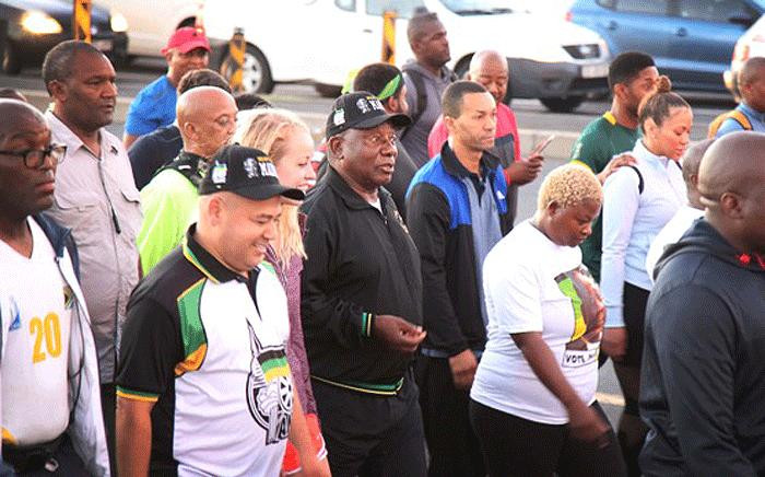 President Cyril Ramaphosa is joined by Western Cape ANC branch members and members of the public during an early morning walk from Gugulethu Stadium to Athlone Stadium in Cape Town on 20 February 2018. Picture: Bertram Malgas/EWN