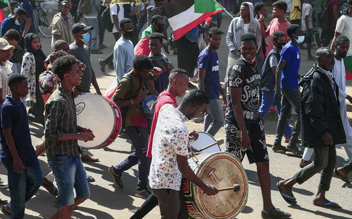 Sudanese demonstrators play the drums during a rally in al-Daim neighbourhood in the capital Khartoum on January 2, 2022, amid calls for pro-democracy rallies in "memory of the martyrs" killed in recent protests. Picture: AFP