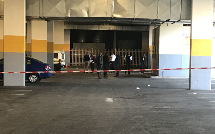 FILE: Police on the scene at the Glen Shopping Centre's basement. Picture: Kgothatso Mogale/EWN