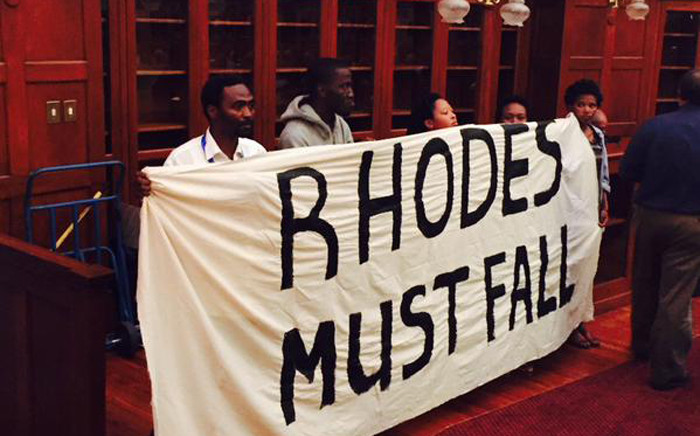 FILE: University of Cape Town students leadership hold a banner in support of Rhodes University students in their bit to have Cecil Rhodes statute on 26 March 2015. Picture: Masa Kekana/EWN.