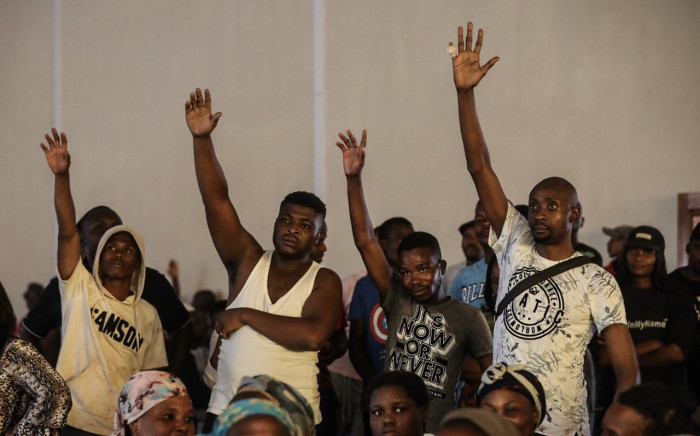 Disgruntled residents displaced by the Tshwane floods react to Gauteng Premier David Makhura’s address at Mamelodi Baptist Church on 11 December 2019. Picture: Abigail Javier/EWN