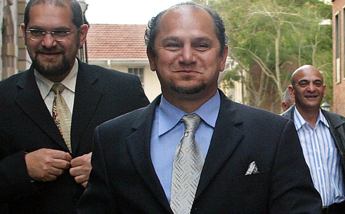 FILE: Schabir Shaik (C) leaves the Durban High court on 26 July 2005. Picture: AFP