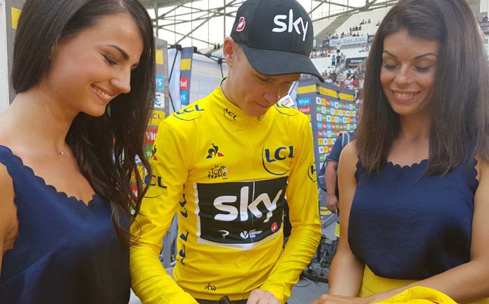 Chris Froome signing a yellow jersey. Picture: Twitter/@LeTour.