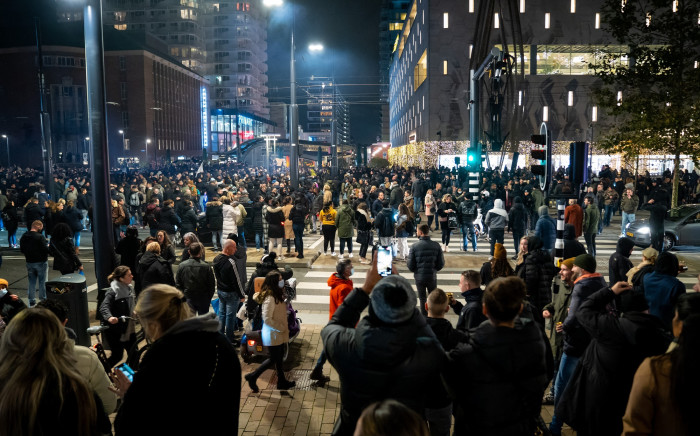 Demonstrators take part in a protest against a partial coronavirus lockdown and against the government policy on 19 November 2021 in Rotterdam. Picture: AFP