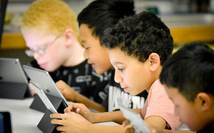 FILE: Schoolchildren pictured during a coding workshop in Cape Town. Picture: Facebook.com