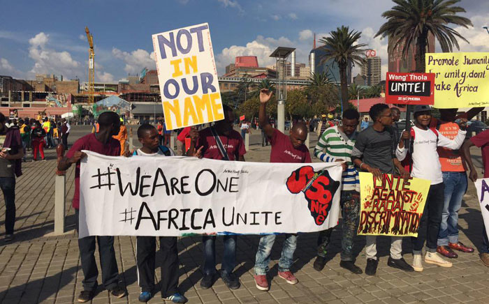 The march against xenophobia attacks ended at the Mary Fitzgerald Square on 23 April 2015, with many people holding signs that call for peace and an end to the attacks. Picture: Emily Corke/EWN.