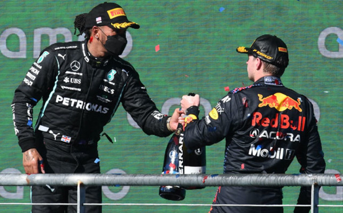 Lewis Hamilton (left) and US Grand Prix winner Max Verstappen celebrate on the podium after the Austin Grand Prix on 24 October 2021. Picture: @F1/Twitter
