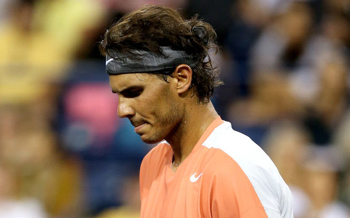 Rafael Nadal walks on the court while playing Alexandr Dolgopolov of Ukraine during the BNP Parabas Open at the Indian Wells Tennis Garden on 10 March, 2014. Picture: AFP.