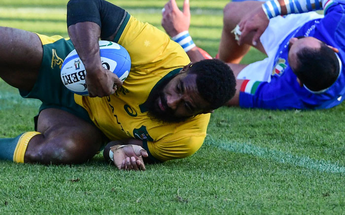 Australia's wing Marika Koroibete scores a try during the international rugby union test match Italy vs Australia on 17 November 2018 at the Euganeo stadium in Padua. Picture: AFP.