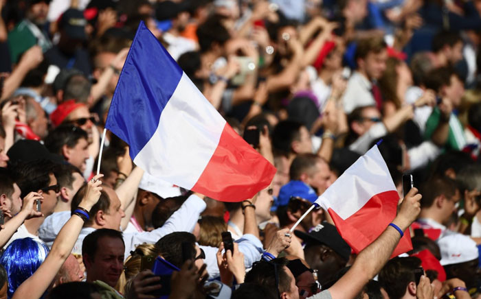France soccer fans waving their country’s flag in support of the team during a World Cup match. Picture: @FrenchTeam/Twitter.