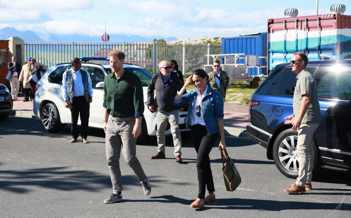 The Duke and Duchess of Sussex, Prince Harry and Meghan Markle arrive at Waves for Change at Monwabisi Beach in Cape Town on 25 September 2019. The couple visited various other initiatives before heading to the beach for a dance and meditation session with young surfers. Picture: Bertram Malgas/EWN
